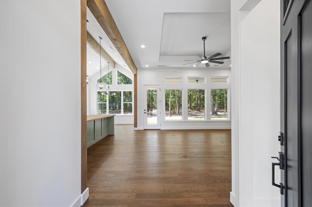 325 Legacy Lane Edgewood, TX 75117 - Photo 9 of 39 a view of an entryway with wooden floor