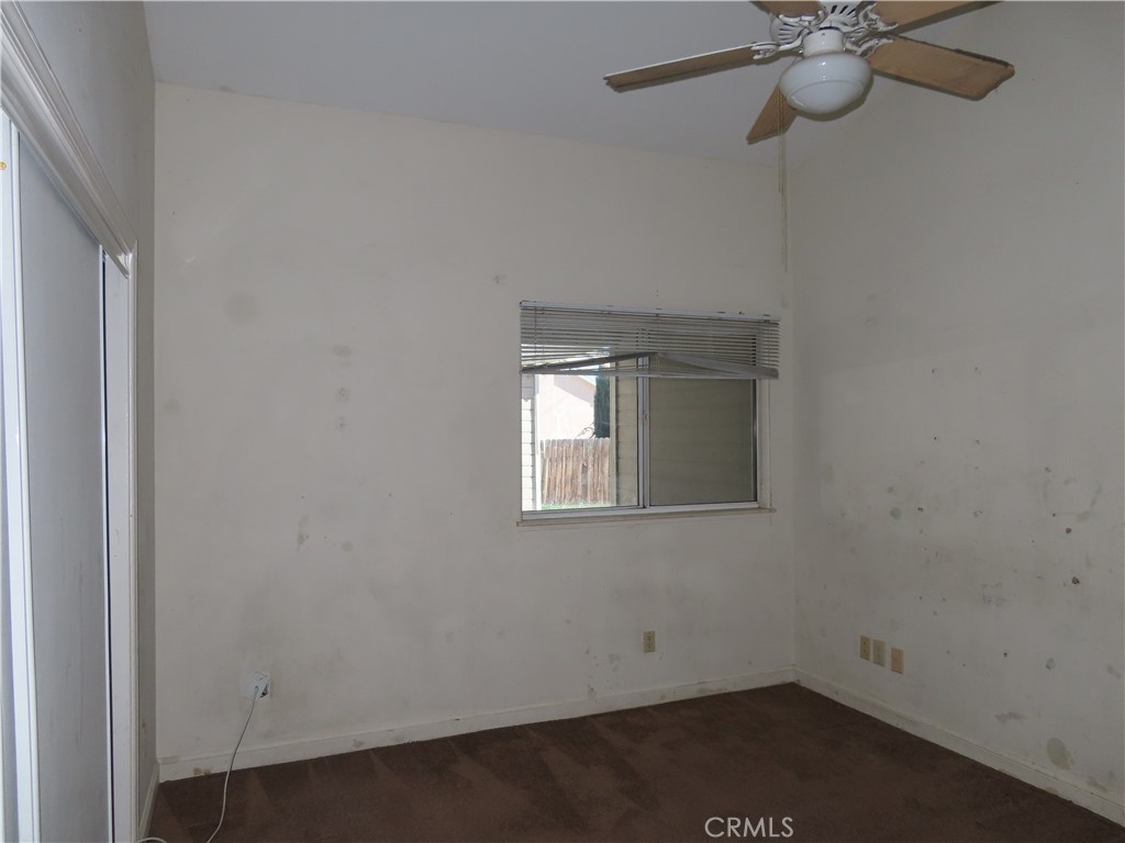 418 West Randall Avenue Rialto, CA 92376 - Photo 11 of 17 an empty room with a window