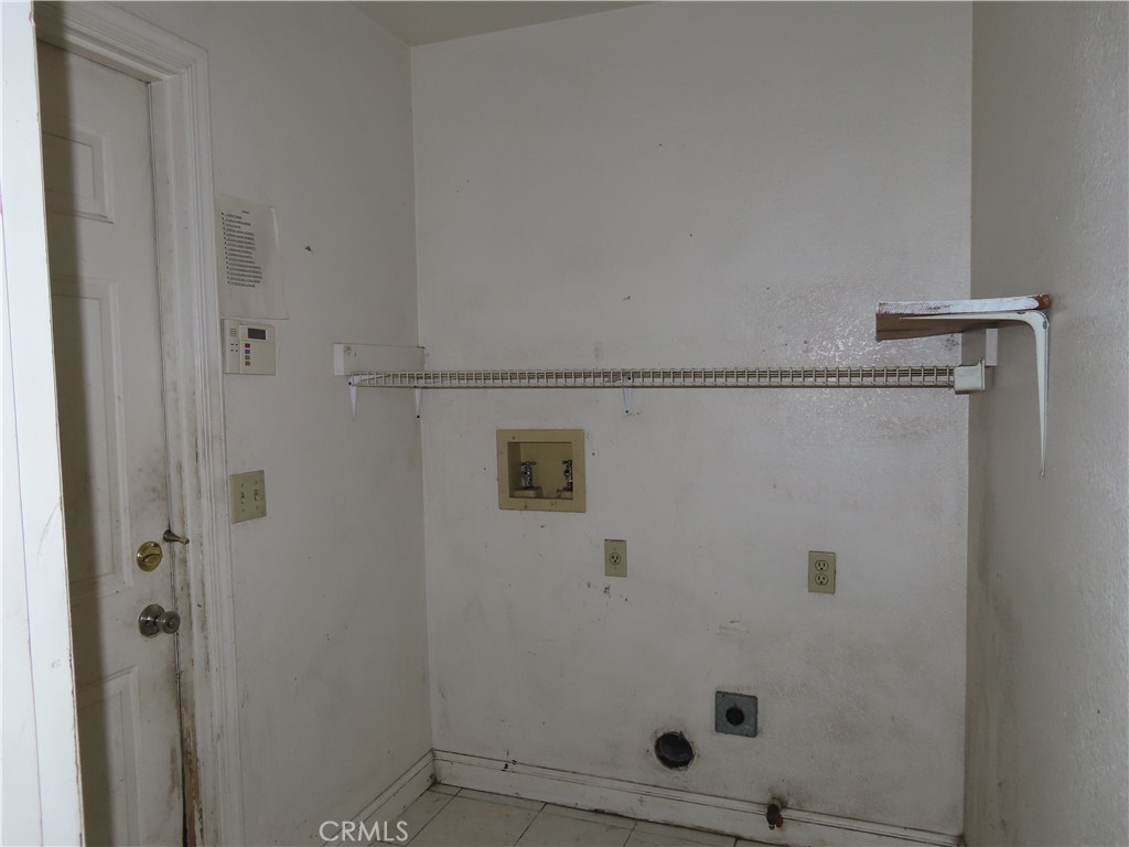 418 West Randall Avenue Rialto, CA 92376 - Photo 12 of 17 a bathroom with a shower