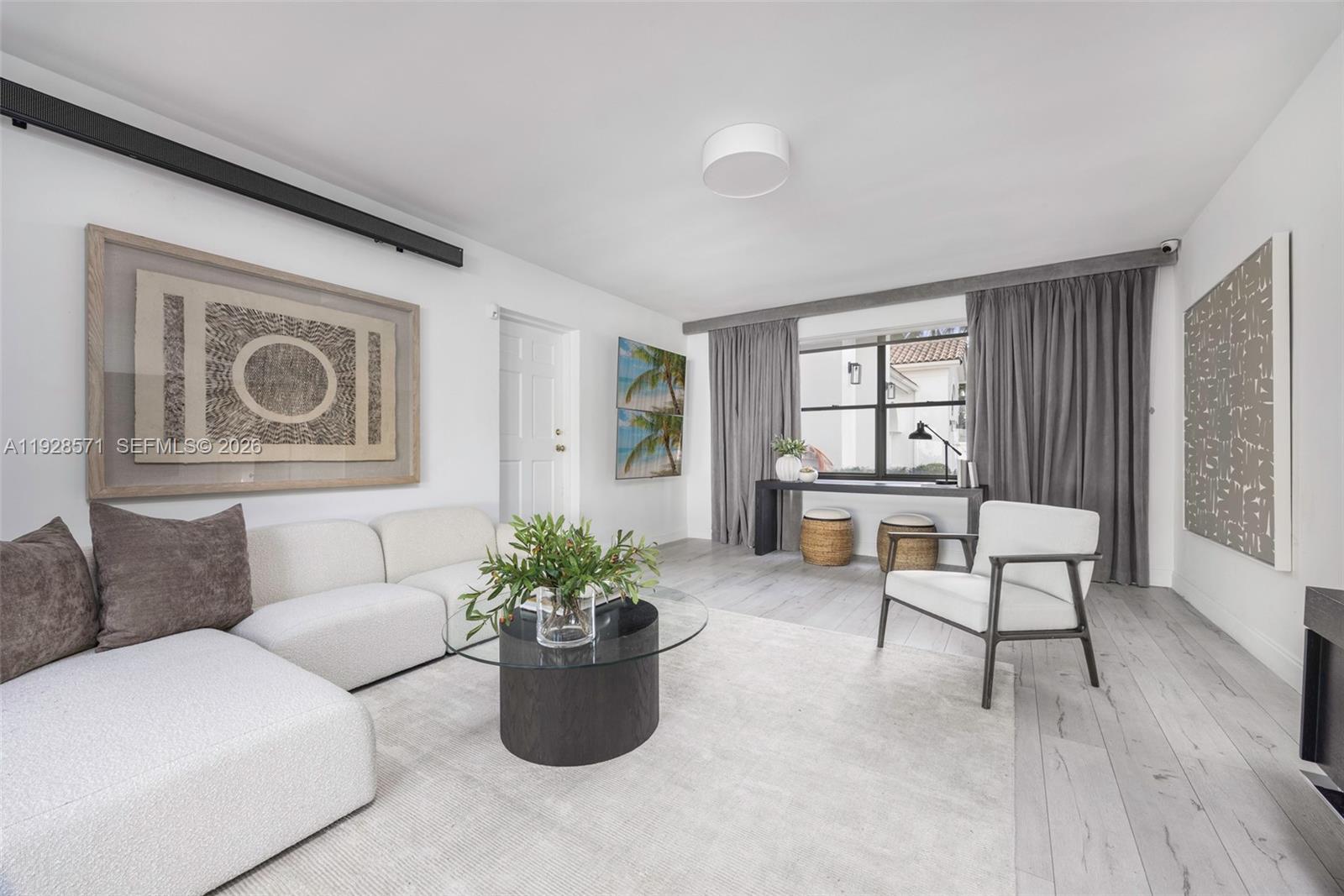 7430 Southwest 66th Street Miami, FL 33143 - Photo 13 of 43 a living room with furniture and a window
