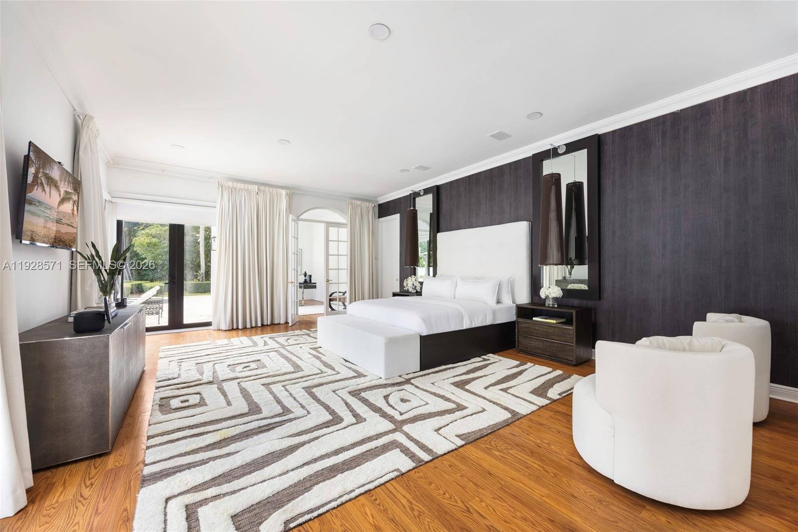 7430 Southwest 66th Street Miami, FL 33143 - Photo 15 of 43 a living room with furniture and a wooden floor