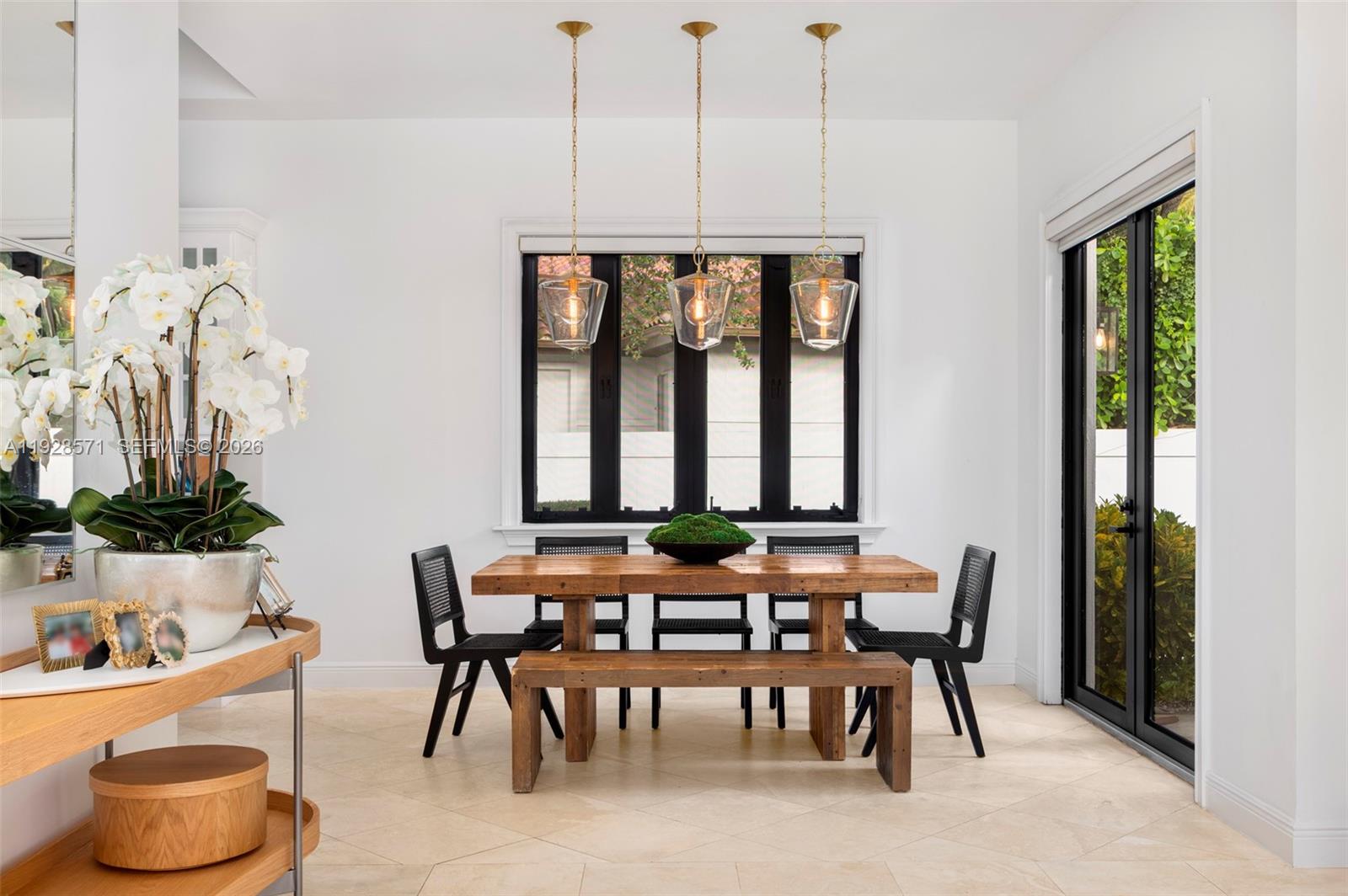 7430 Southwest 66th Street Miami, FL 33143 - Photo 10 of 43 a dining room with furniture window and natural light