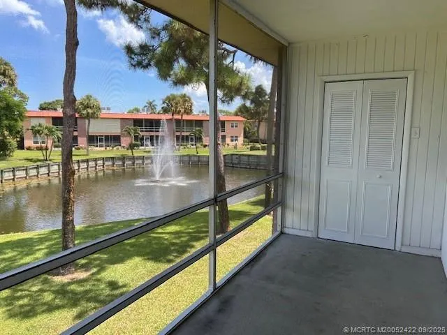 a view of swimming pool from a balcony
