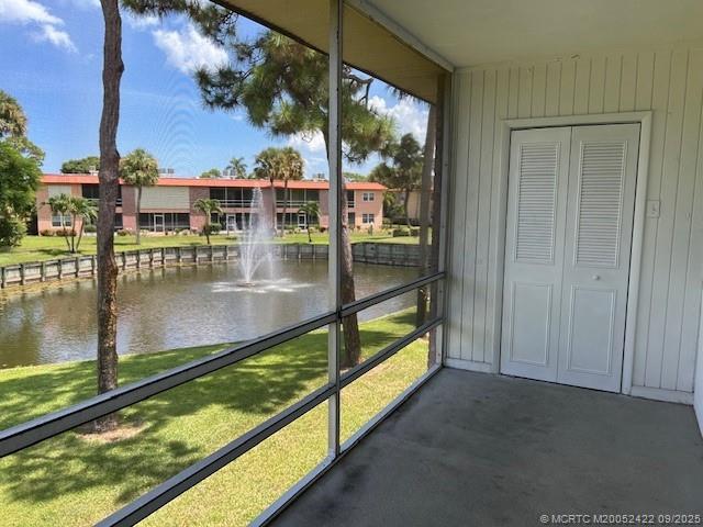 1903 Southwest Palm City Road, Unit H Stuart, FL 34994 - Photo 11 of 31 a view of swimming pool from a balcony