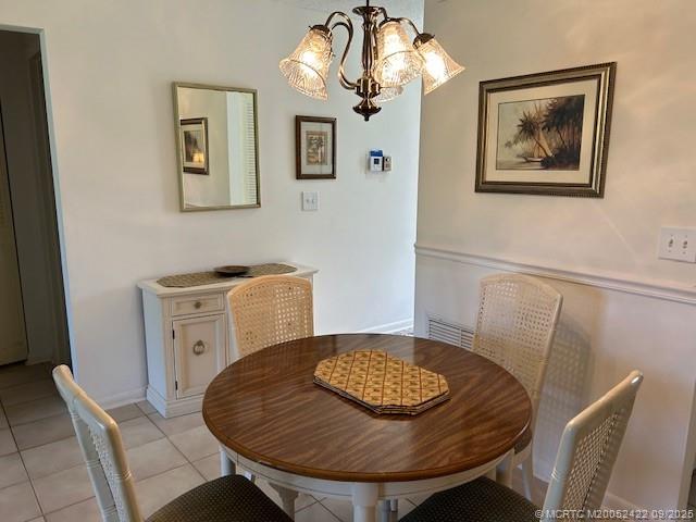 1903 Southwest Palm City Road, Unit H Stuart, FL 34994 - Photo 8 of 31 a view of a dining room with furniture