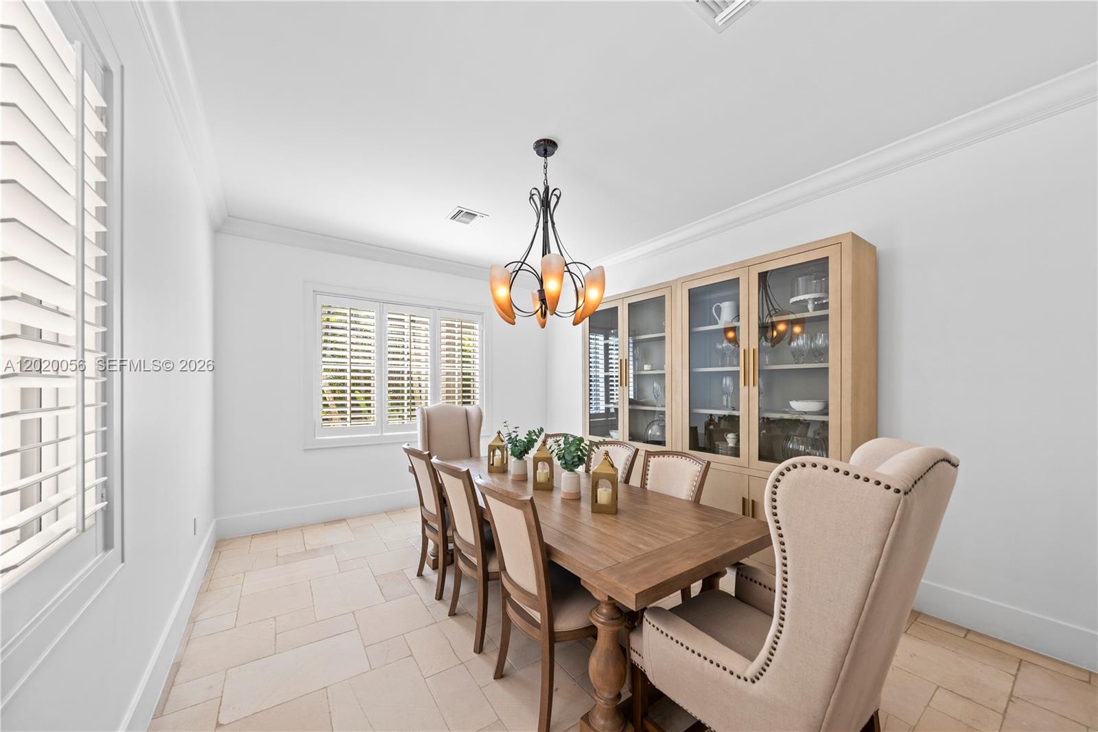 4196 Douglas Road Miami, FL 33133 - Photo 25 of 96 a view of a dining room with furniture window and outside view