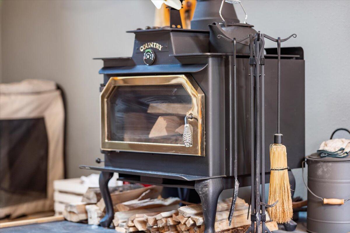 1735 Rector Road La Pine, OR 97739 - Photo 15 of 40 Woodstove sits on Slate Slab