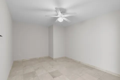 a view of a small space with a fan