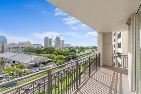 a view of a balcony with wooden floor