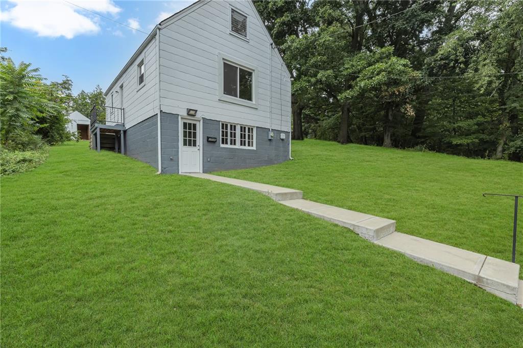 1736 Pierce Street Aliquippa, PA 15001 - Photo 3 of 19 a view of a house with a yard
