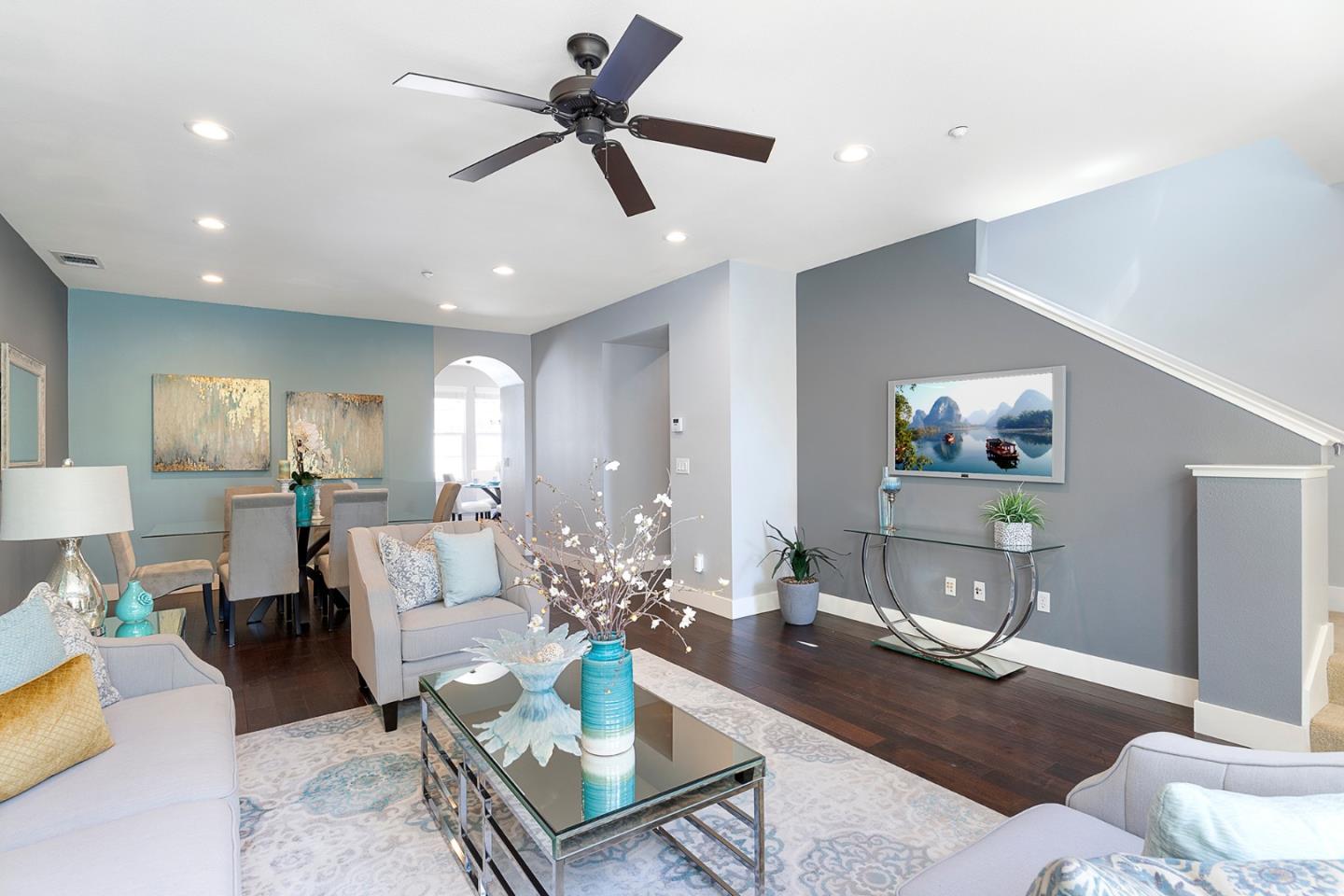 407 Topaz Terrace Sunnyvale, CA 94089 - Photo 12 of 33 a living room with furniture and a wooden floor