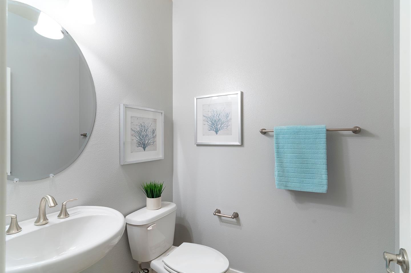 407 Topaz Terrace Sunnyvale, CA 94089 - Photo 17 of 33 a bathroom with a toilet sink and mirror