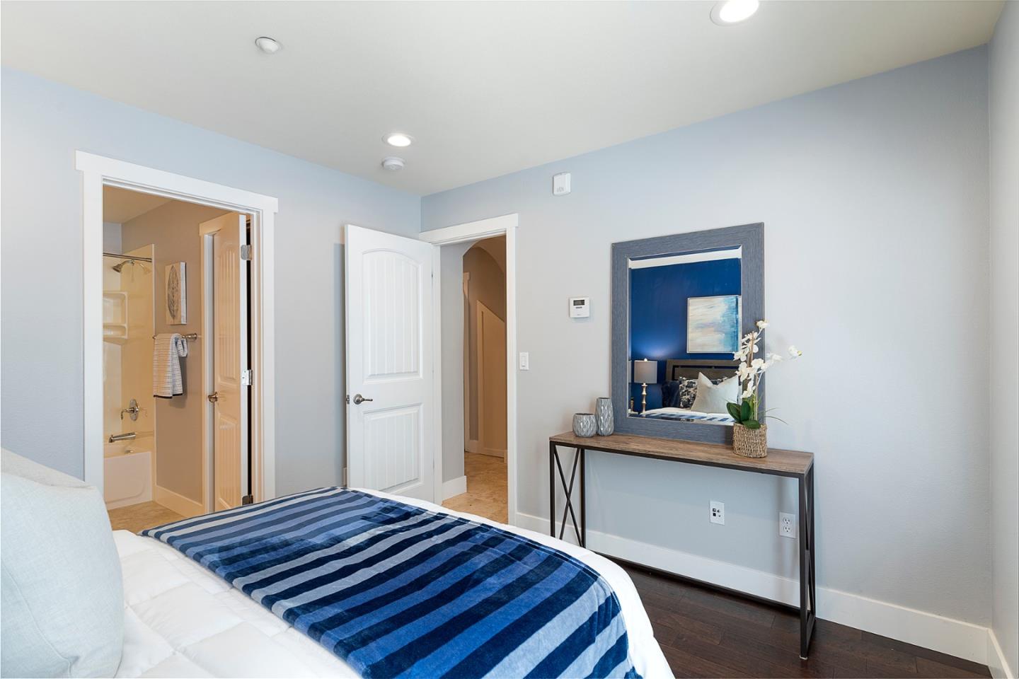 407 Topaz Terrace Sunnyvale, CA 94089 - Photo 8 of 33 a bedroom with a bed and a dresser in it