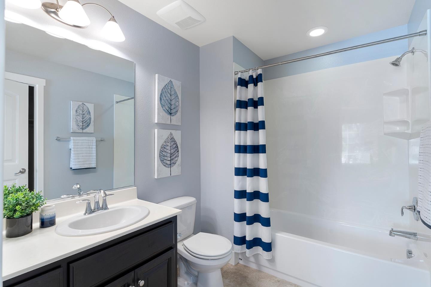 407 Topaz Terrace Sunnyvale, CA 94089 - Photo 9 of 33 a bathroom with a sink a toilet and shower