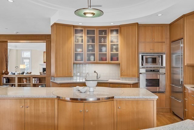 120 Seaver Street, Unit C102 Brookline, MA 02445 - Photo 13 of 30 a kitchen with a appliances and cabinets