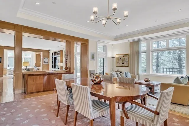 a view of a dining room with furniture window and outside view