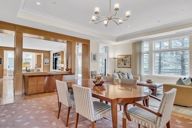 120 Seaver Street, Unit C102 Brookline, MA 02445 - Photo 3 of 30 a view of a dining room with furniture window and outside view