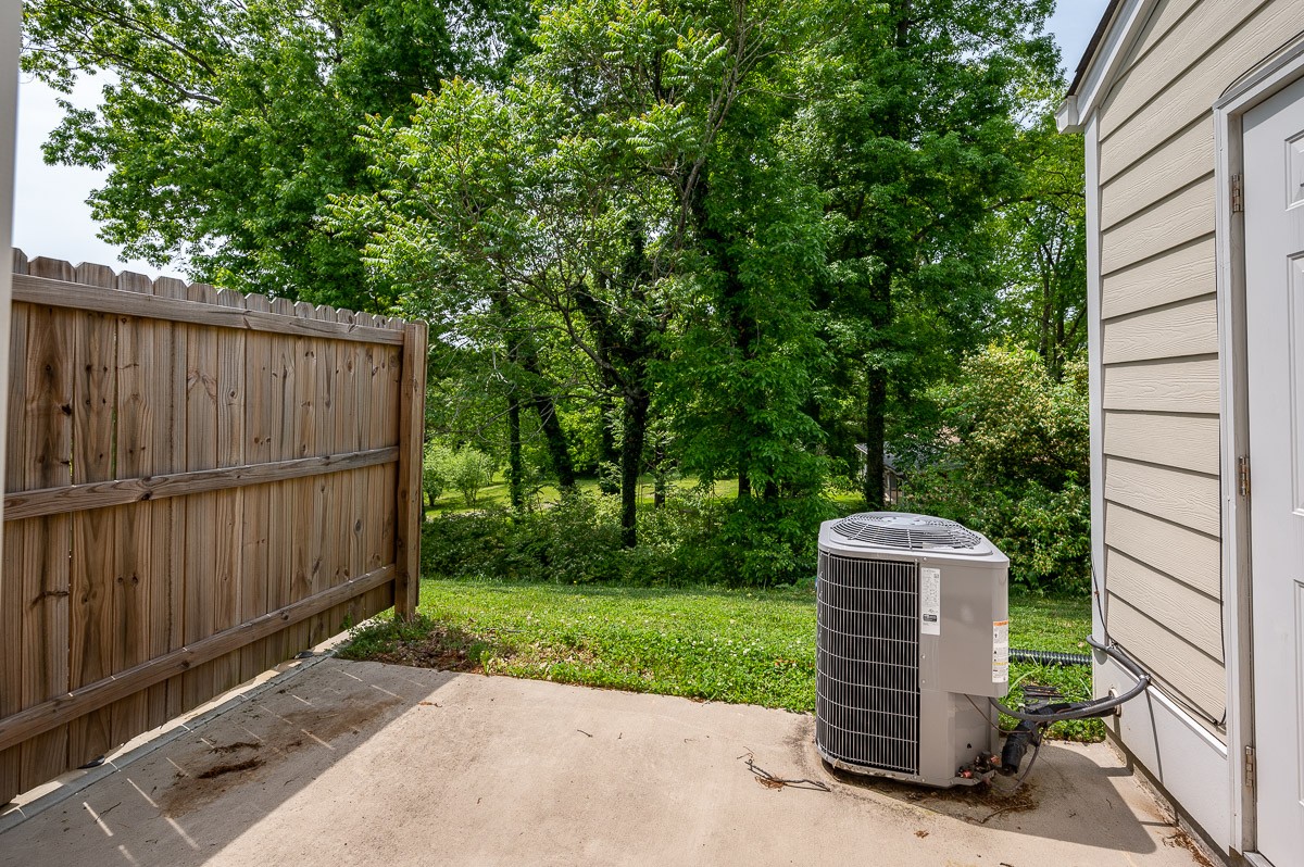 1382 Rural Hill Road, Unit 310 Antioch, TN 37013 - Photo 12 of 12 a front view of a house with a garden