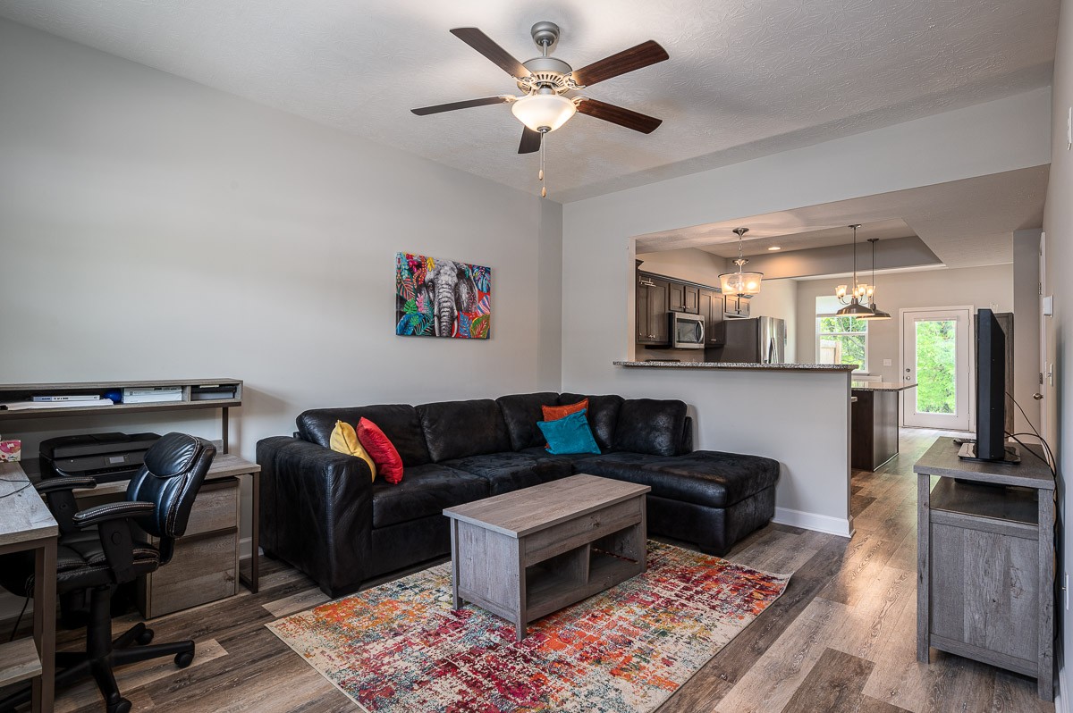 1382 Rural Hill Road, Unit 310 Antioch, TN 37013 - Photo 3 of 12 a living room with furniture and a rug