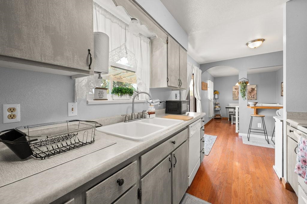 3022 Country Road Grand Junction, CO 81504 - Photo 16 of 23 a spacious bathroom with a double vanity sink a mirror and a bathtub