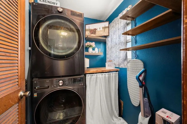 a view of workspace with wooden floor and window