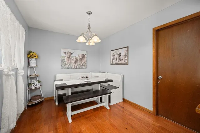 a room with furniture and wooden floor