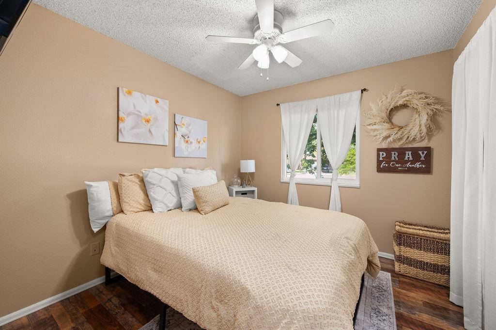3022 Country Road Grand Junction, CO 81504 - Photo 7 of 23 a bedroom with a large bed and a window