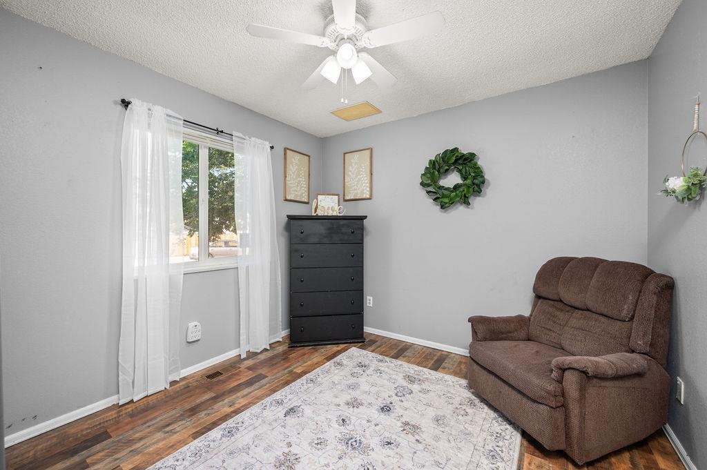 3022 Country Road Grand Junction, CO 81504 - Photo 8 of 23 a bedroom with a bed and a couch