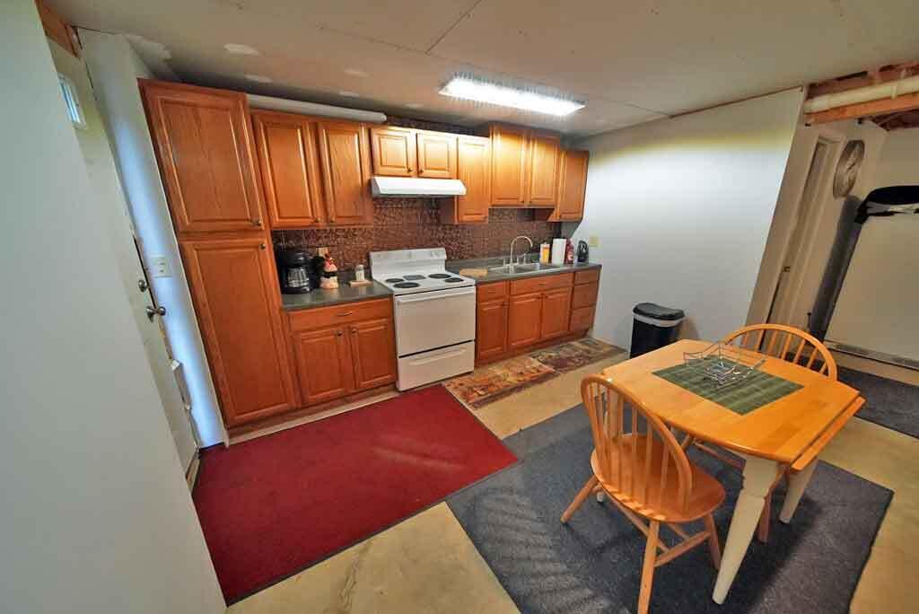 217 Campbell Road New Limerick, ME 04761 - Photo 51 of 92 kitchen-oak-cabinet-basemen