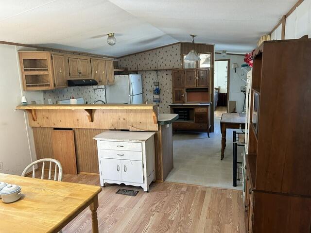 264 Marshfield Flats Road Marshfield, ME 04654 - Photo 10 of 16 dining to kitchen
