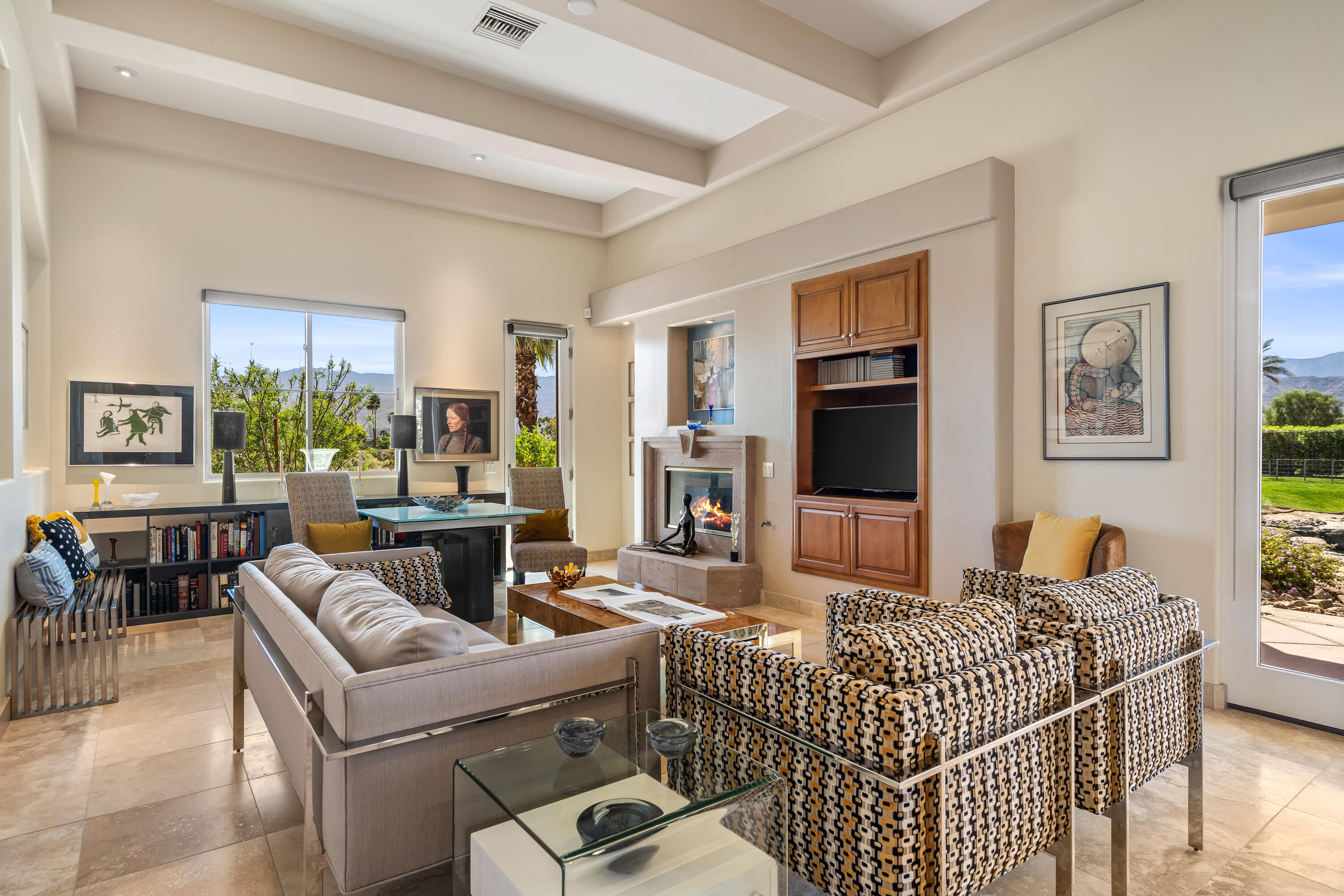 106 Piazza Perrone Palm Desert, CA 92260 - Photo 14 of 68 a living room with furniture and a flat screen tv