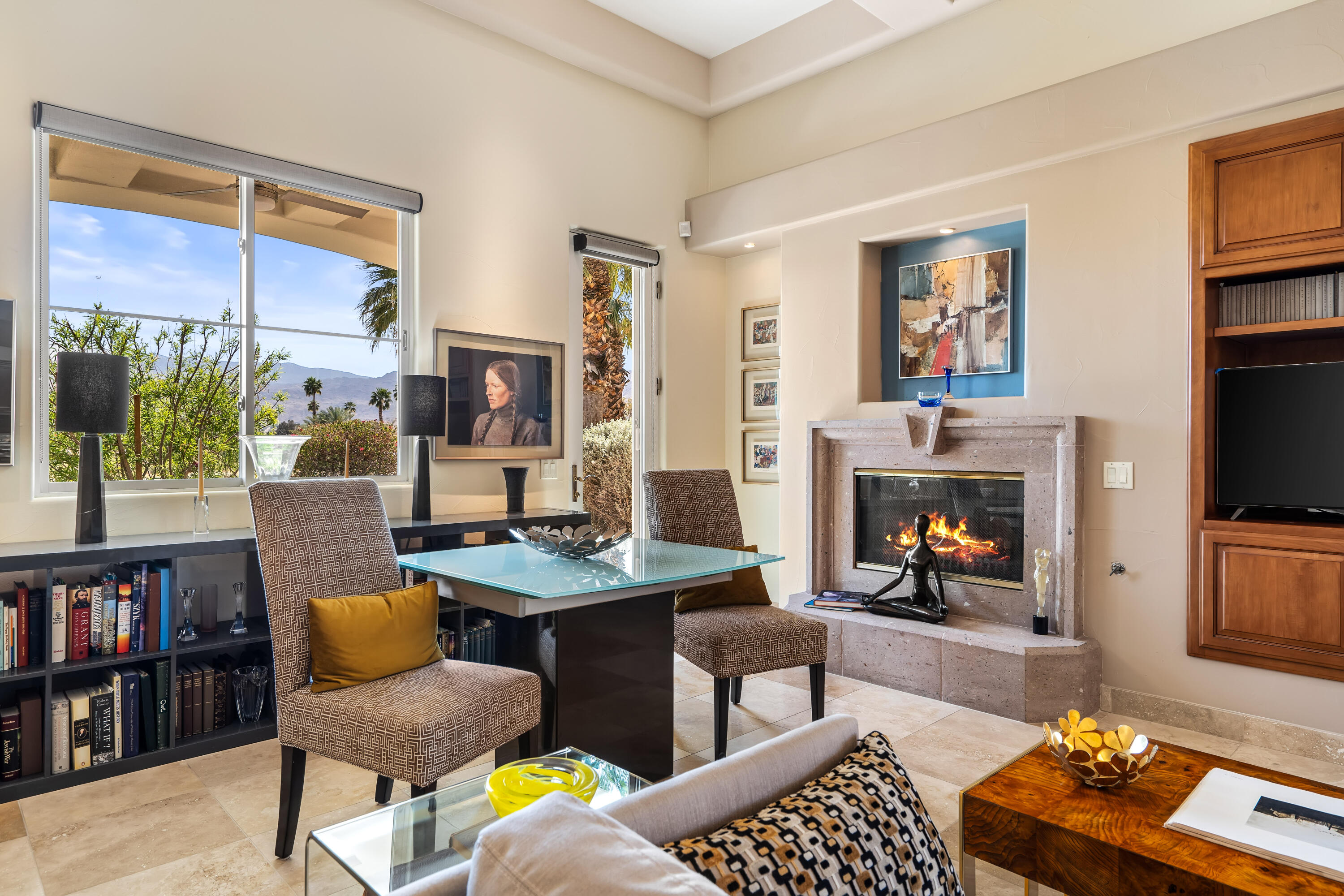106 Piazza Perrone Palm Desert, CA 92260 - Photo 17 of 68 a living room with furniture and a fireplace