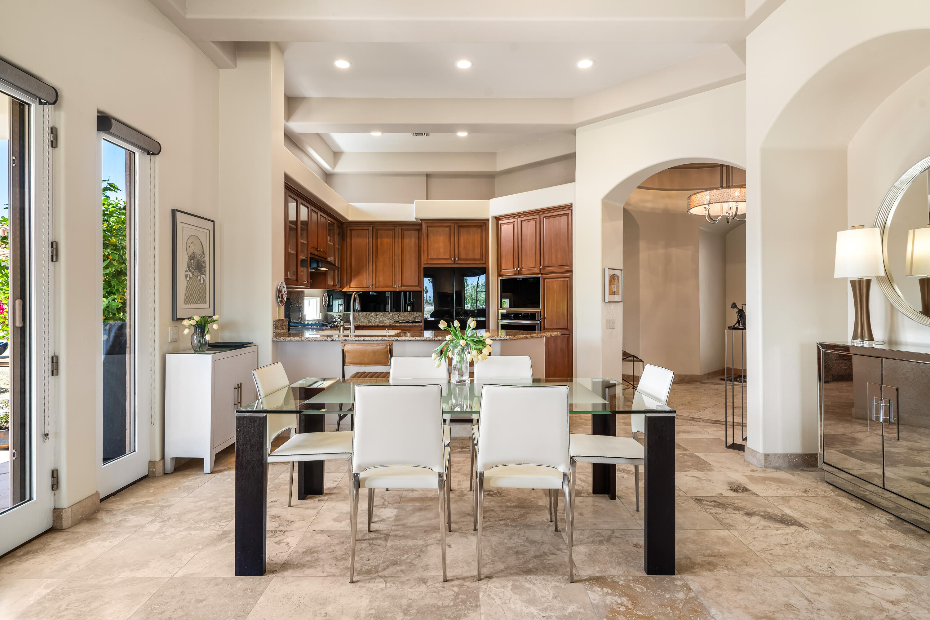 106 Piazza Perrone Palm Desert, CA 92260 - Photo 21 of 68 a view of a dining area with furniture
