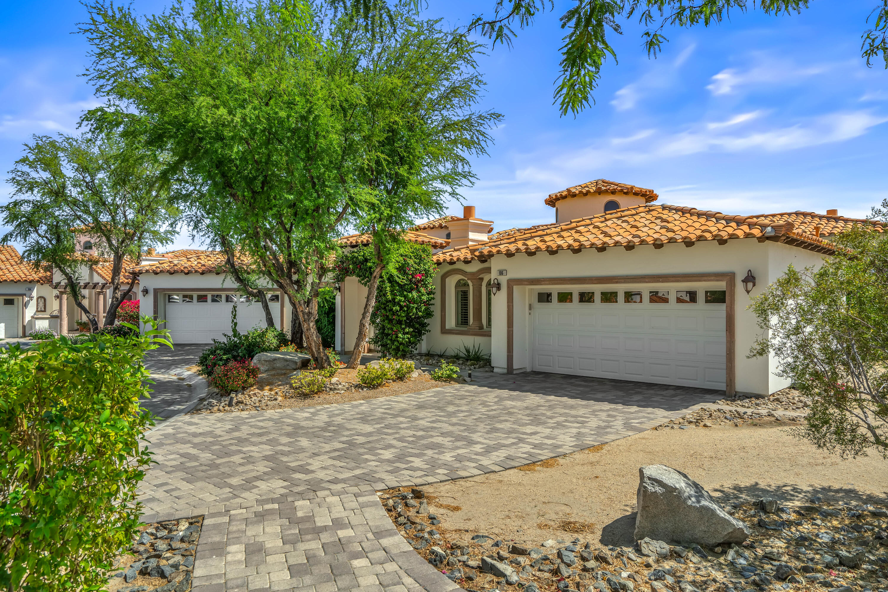 106 Piazza Perrone Palm Desert, CA 92260 - Photo 6 of 68 a view of a water with a building in the background