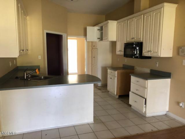7948 Martin Bluff Road, Unit 1 Gautier, MS 39553 - Photo 9 of 21 IMG_1296