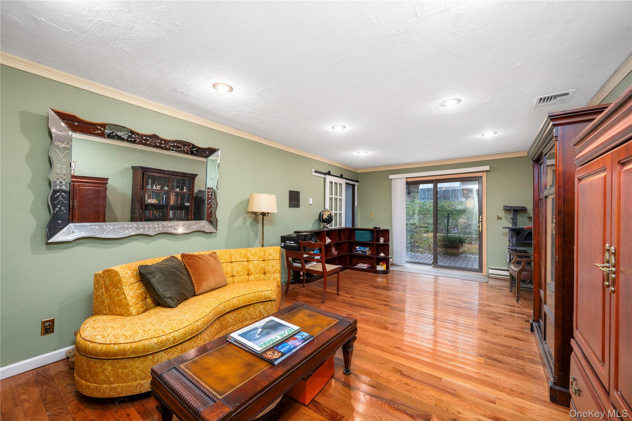 630 Union Valley Road Mahopac, NY 10541 - Photo 12 of 34 a living room with furniture and wooden floor