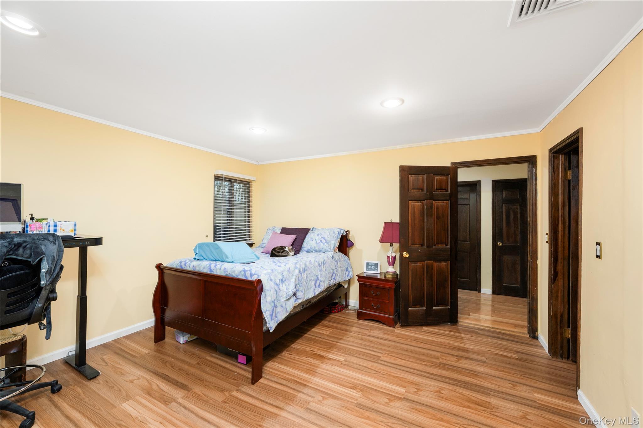 630 Union Valley Road Mahopac, NY 10541 - Photo 13 of 34 a bedroom with furniture and wooden floor