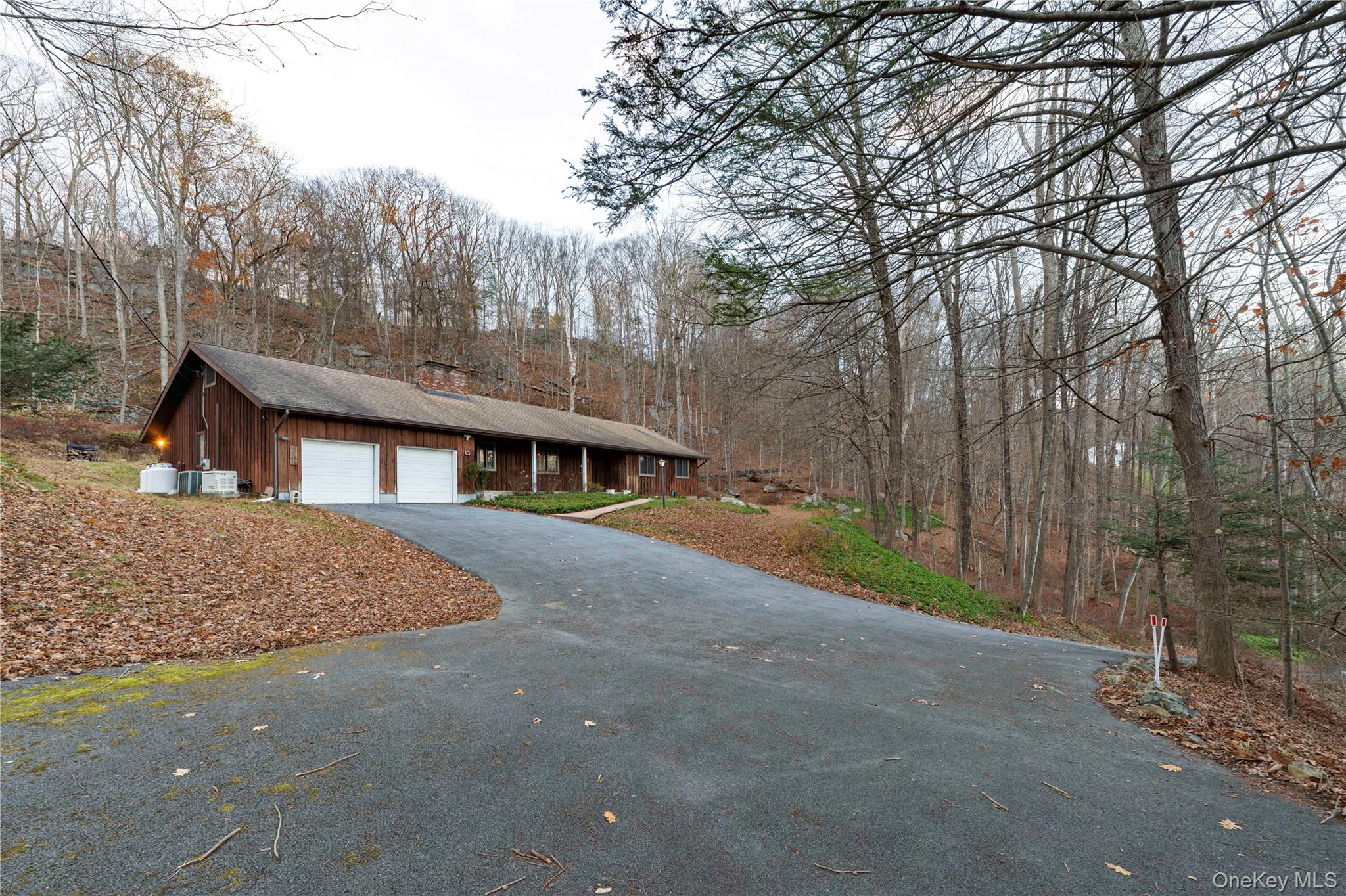 630 Union Valley Road Mahopac, NY 10541 - Photo 27 of 34 a view of a house with a big yard and large tree