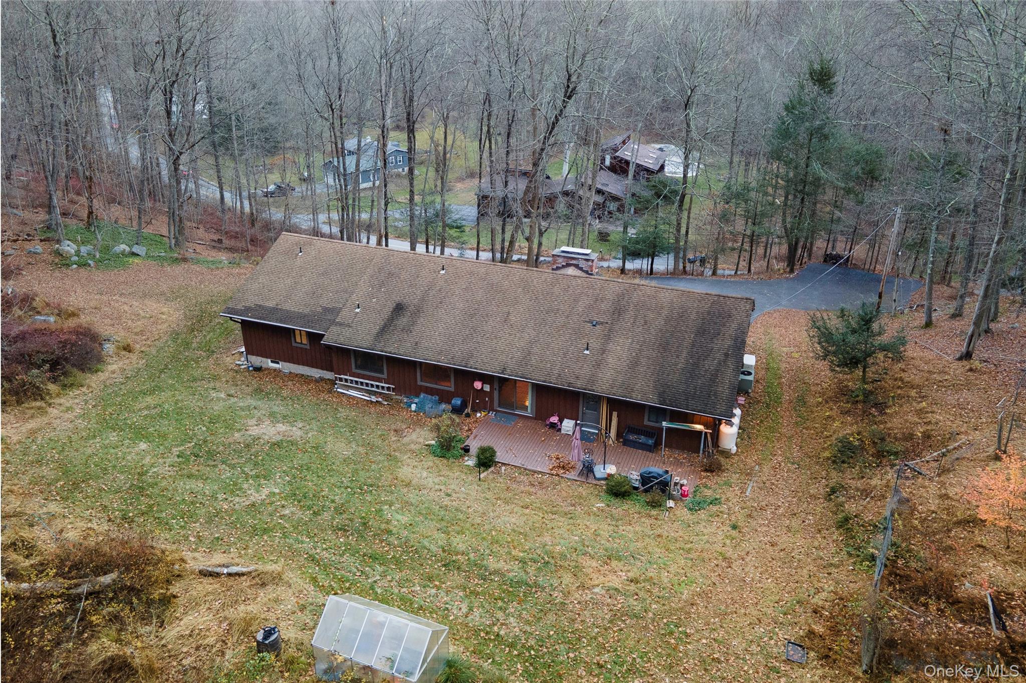 630 Union Valley Road Mahopac, NY 10541 - Photo 28 of 34 an aerial view of a house with a yard basket ball court and outdoor seating