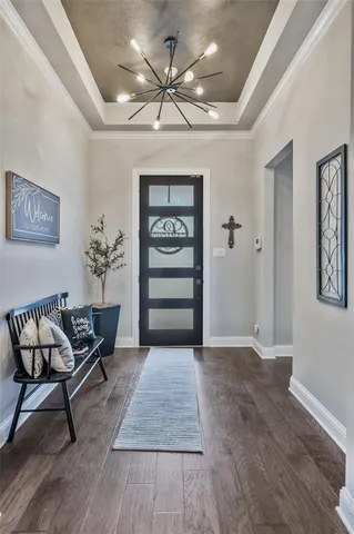 a living room with furniture and a ceiling fan