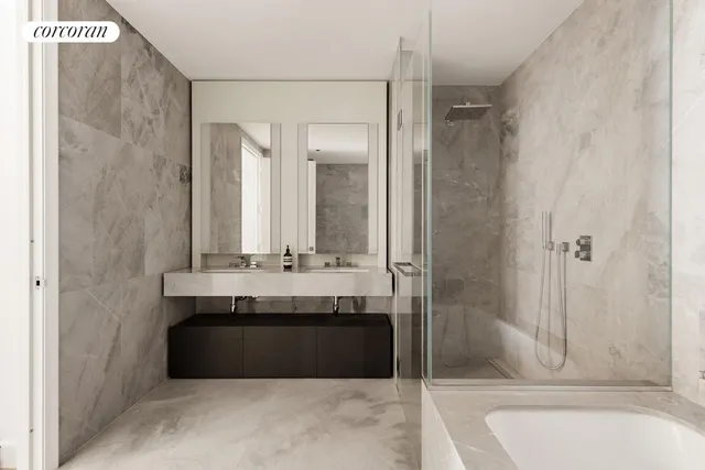 a living room with furniture a large window and a flat screen tv