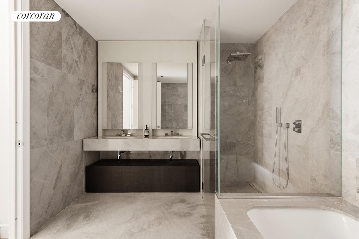 15 Hudson Yards, Unit 72C Manhattan, NY 10001 - Photo 2 of 5 a bathroom with a bathtub and a sink