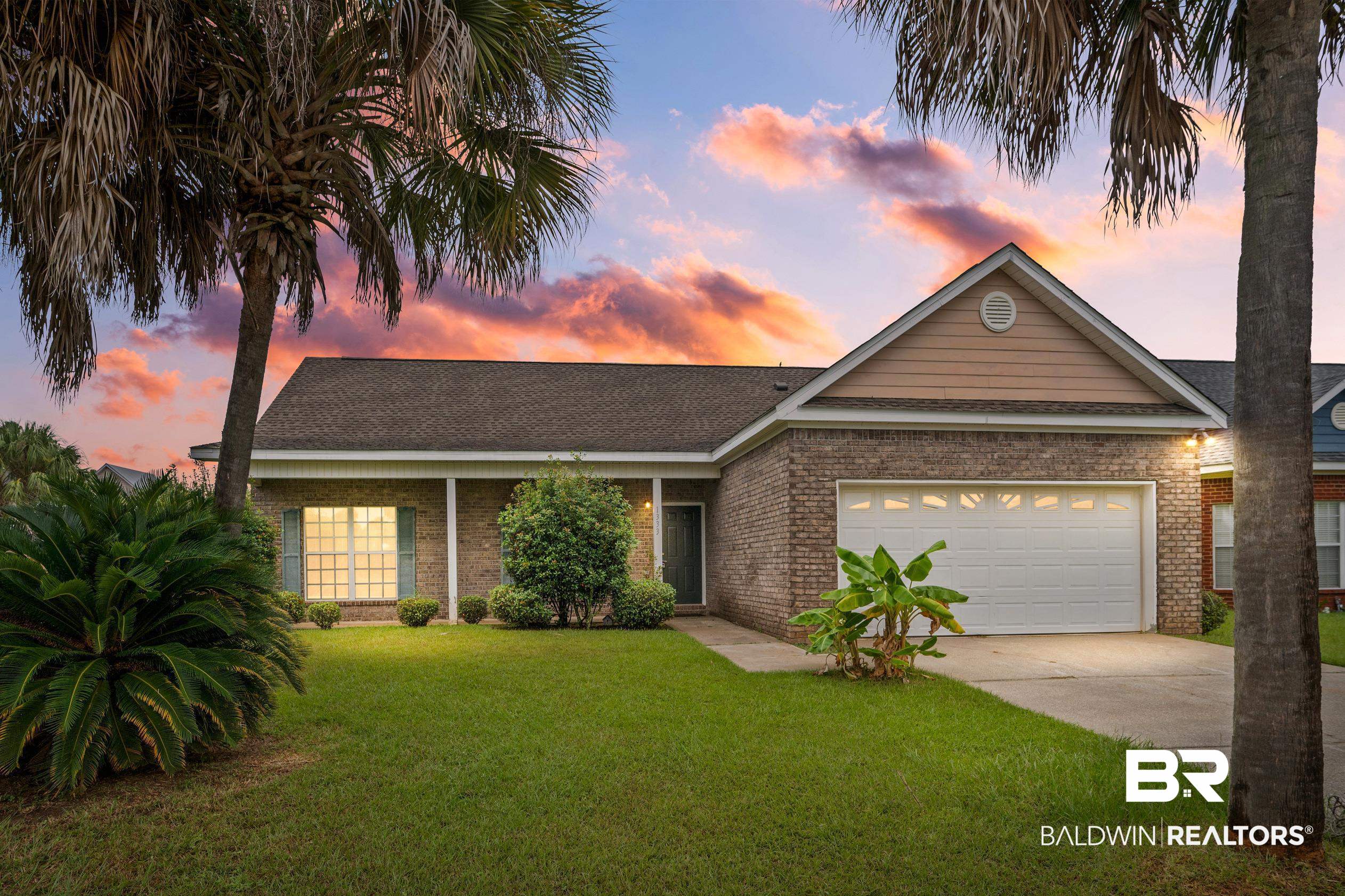 1333 Dominoe Trail Foley, AL 36535 - Photo 29 of 32 Ranch-style home with a lawn and a garage