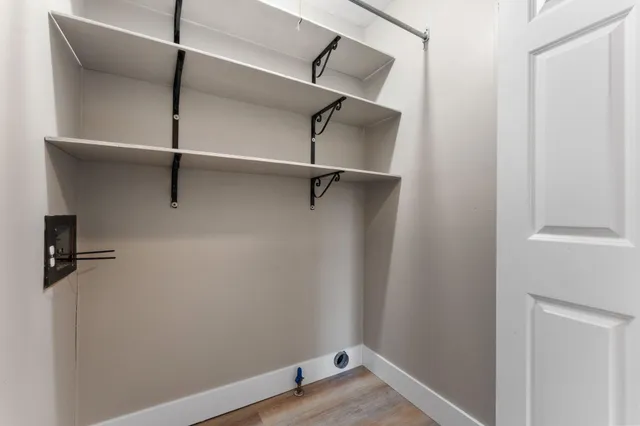 a view of a room with rack on the wall