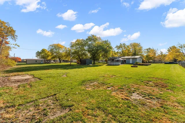 a view of an ocean and a yard