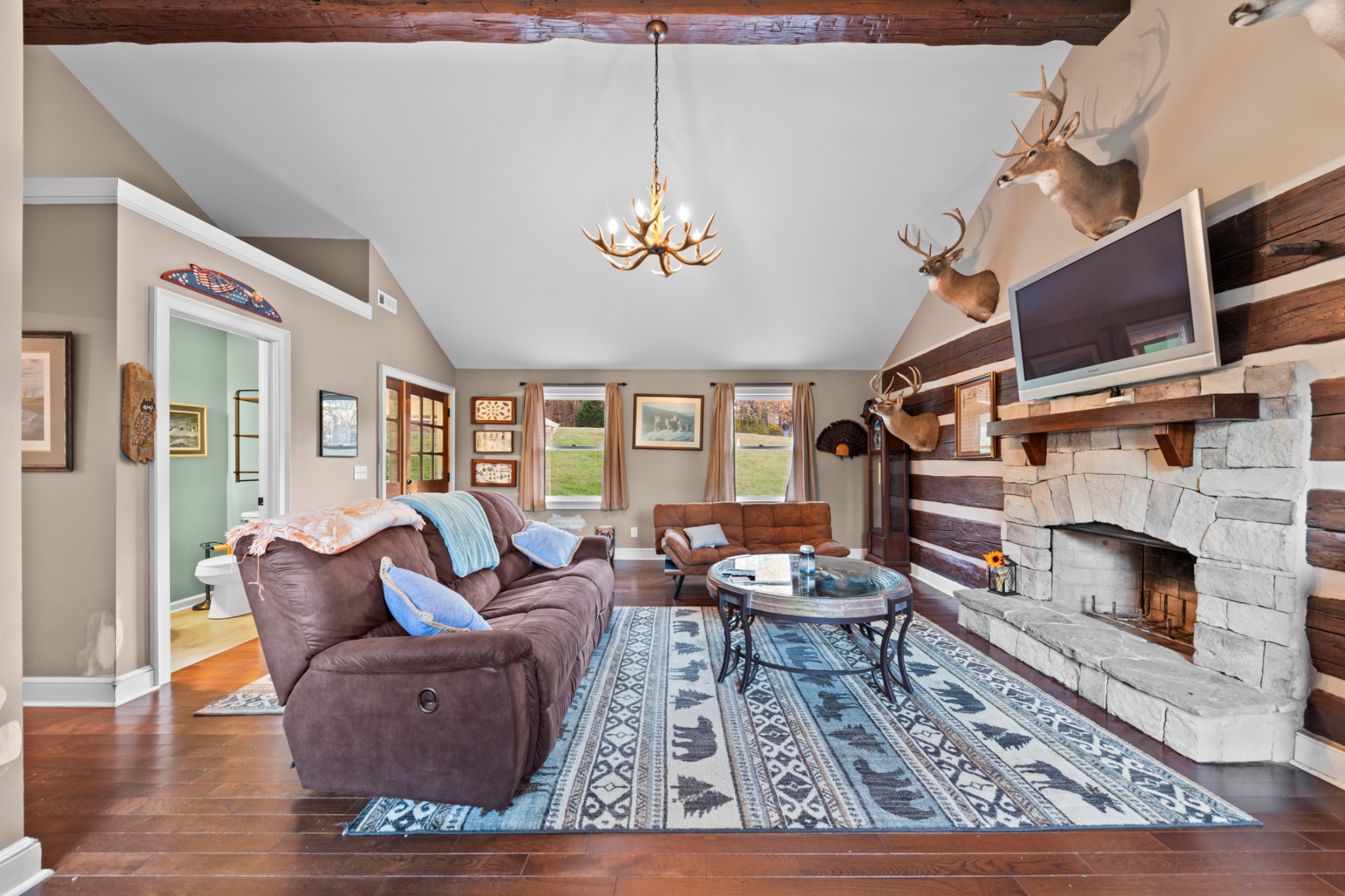 2115 Rock Springs Road Columbia, TN 38401 - Photo 12 of 44 a living room with furniture fireplace and flat screen tv