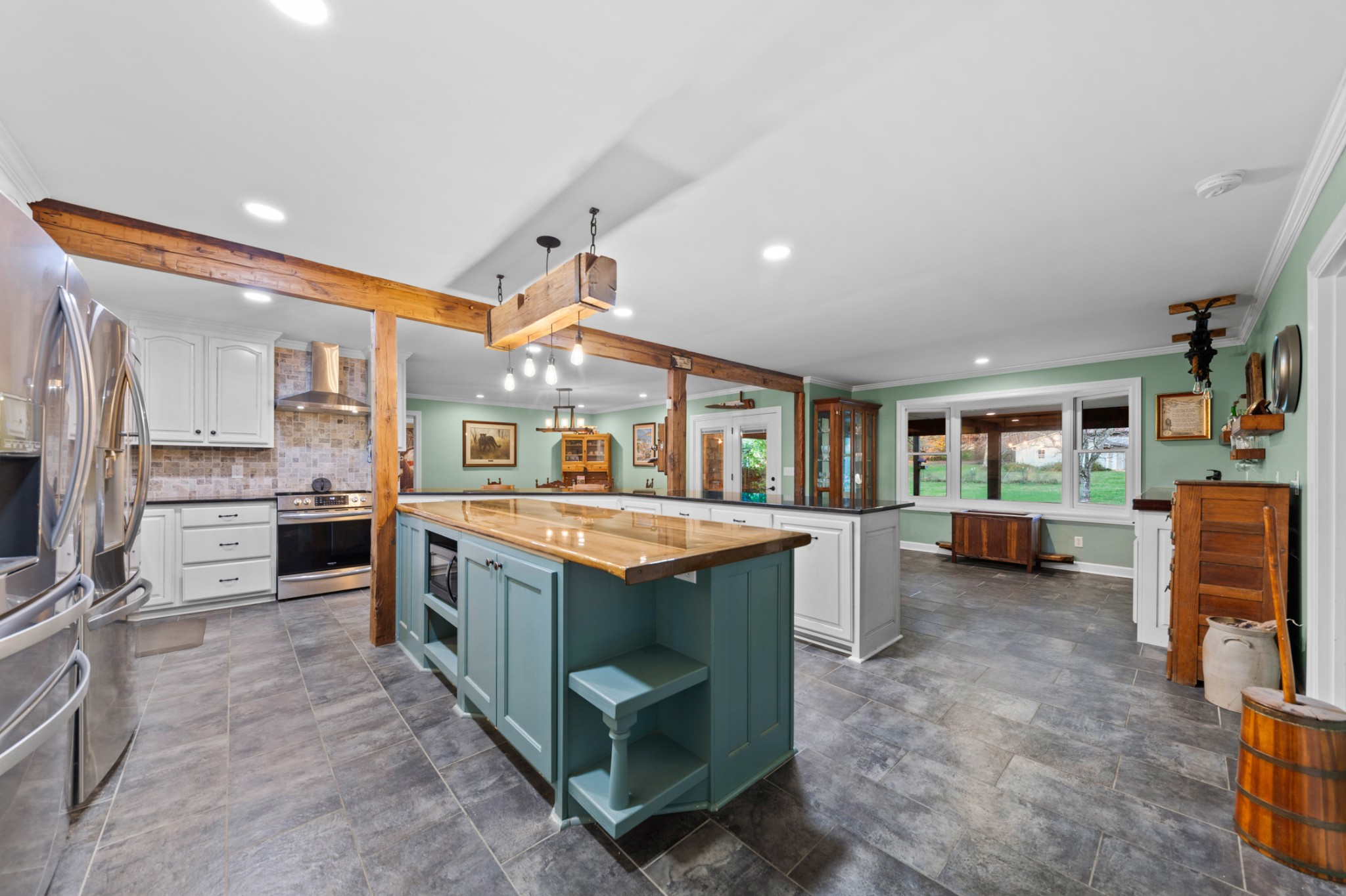 2115 Rock Springs Road Columbia, TN 38401 - Photo 14 of 44 a kitchen with stainless steel appliances granite countertop a stove and a refrigerator