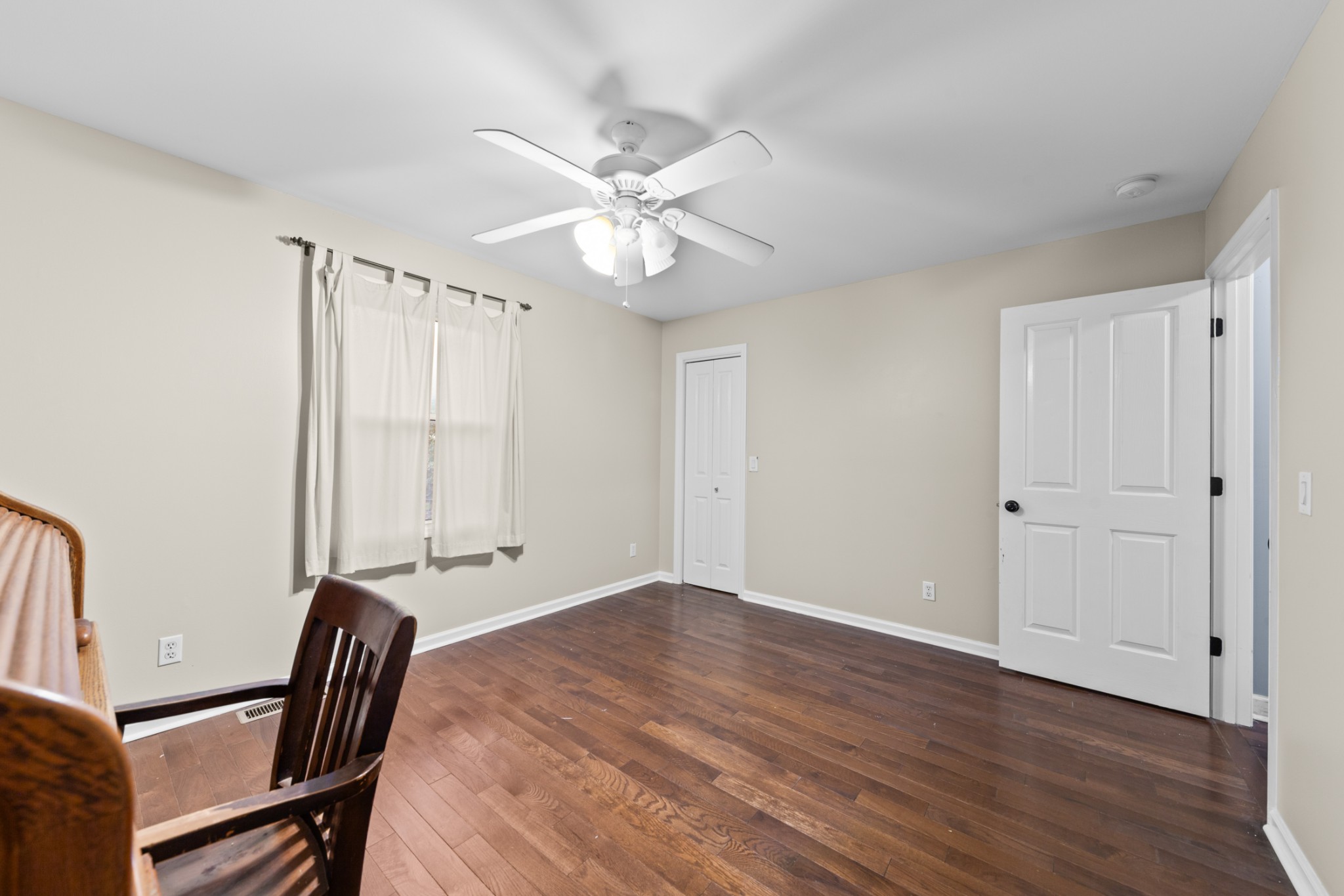 2115 Rock Springs Road Columbia, TN 38401 - Photo 26 of 44 a view of an empty room with a window and wooden floor