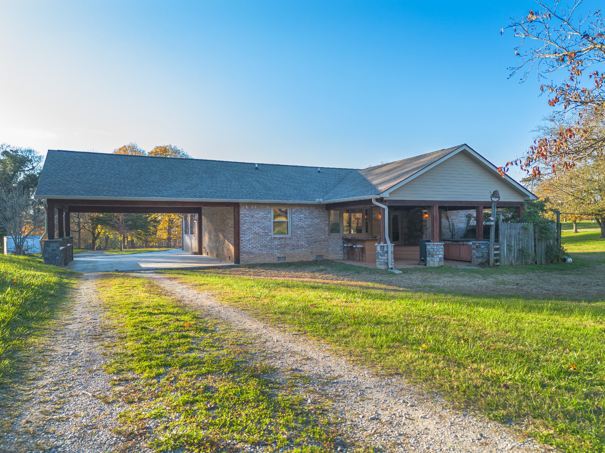 2115 Rock Springs Road Columbia, TN 38401 - Photo 28 of 44 a front view of a house with swimming pool having outdoor seating