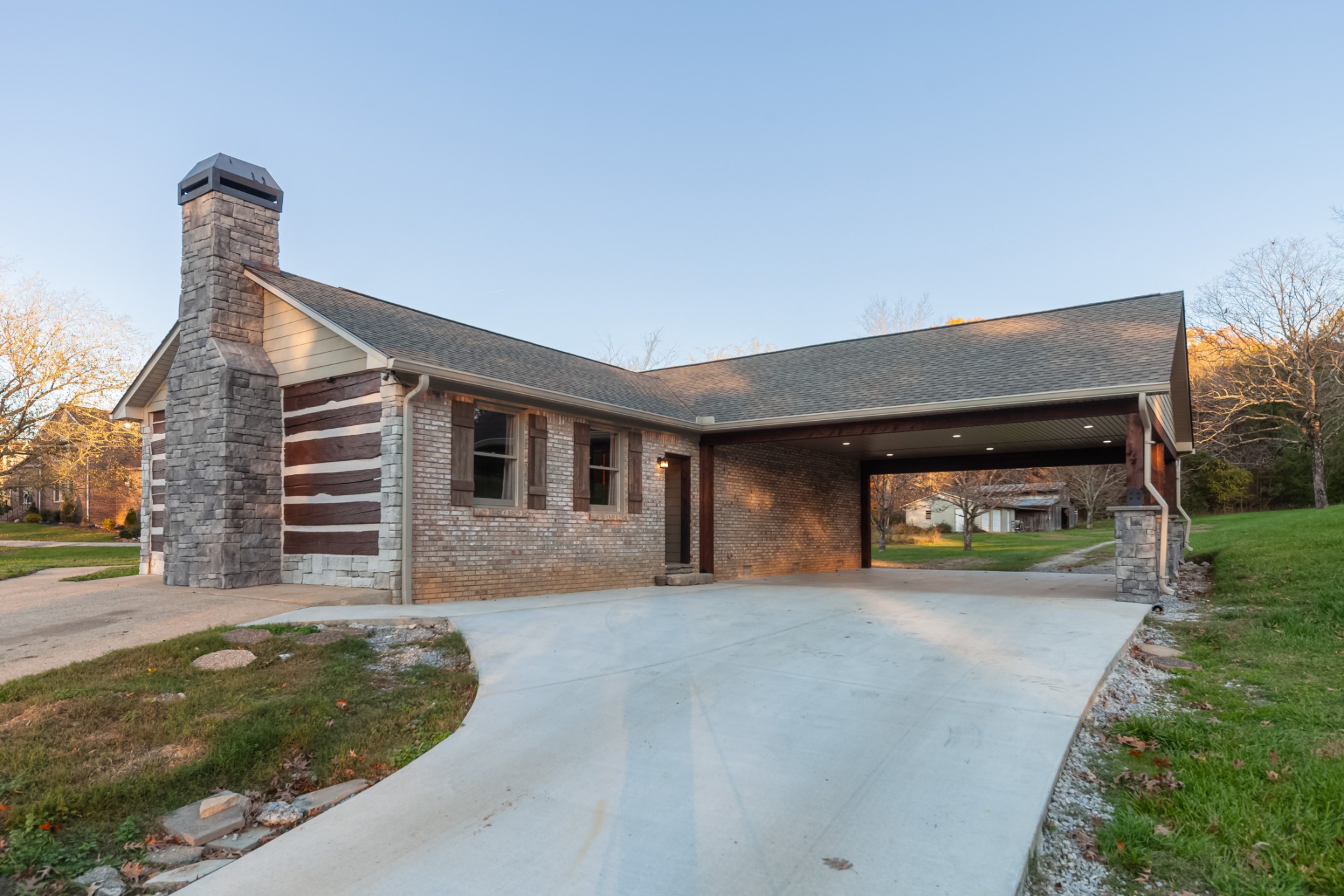 2115 Rock Springs Road Columbia, TN 38401 - Photo 6 of 44 a front view of a house with a yard and garage